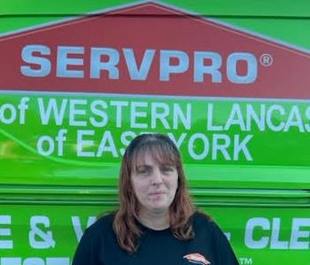 Stacey Beaner in front of SERVPRO van