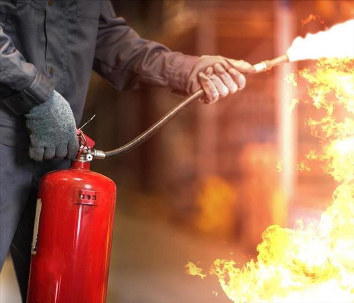 Fire Extinguisher Putting out Fire